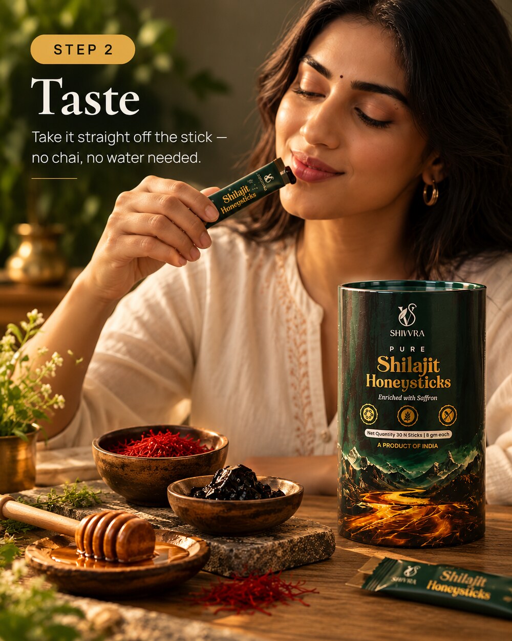 Woman taking shilajit honey straight from the opened honeystick